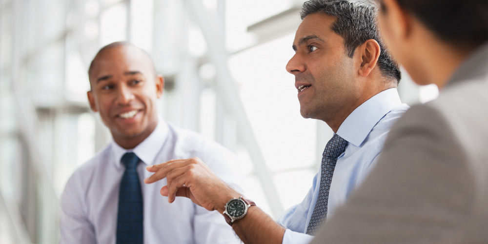 employees chatting about developing management skills
