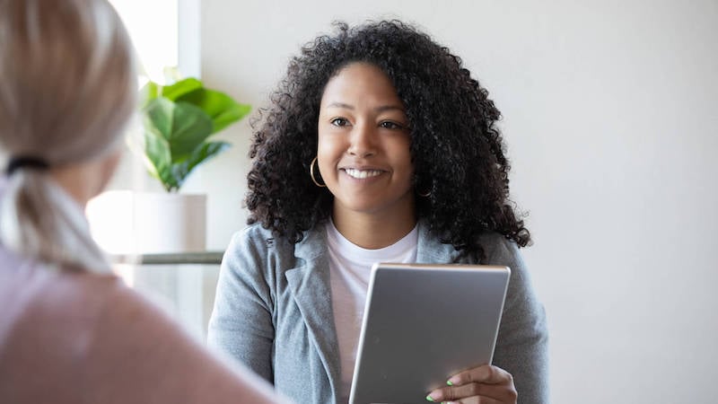 employee-coaching-woman-talking-with-person