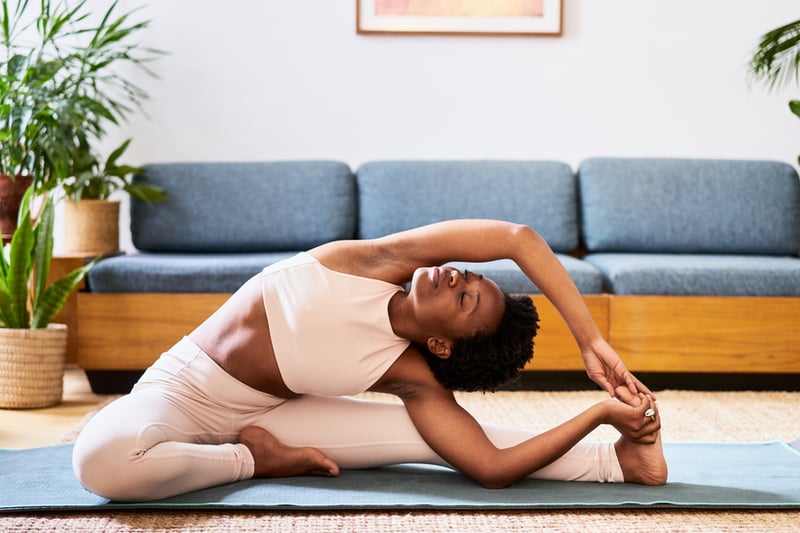 woman-doing-yoga-at-home-good-habits